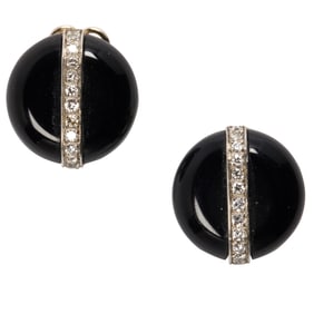 A pair of diamond, onyx, and platinum ear-clips