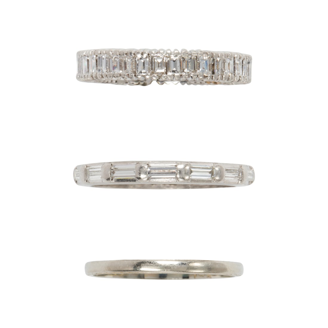 Two diamond and platinum rings and one 14k white gold ring (1 of 2)