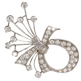 A diamond and 14k white gold brooch