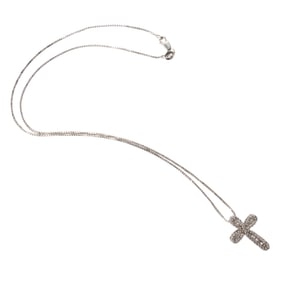 A diamond and 14k white gold cross pendant necklace