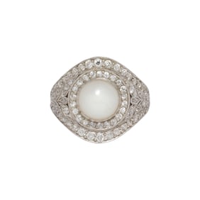 An art deco, cultured pearl, diamond and platinum ring