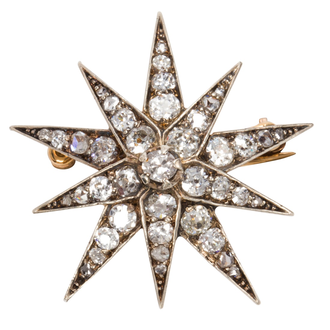 A Victorian diamond and silver-topped 14k gold starburst brooch (1 of 1)