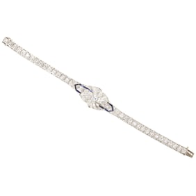An art deco style diamond, sapphire, and 14k white gold bracelet