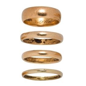 Three 14k and one 18k gold bands