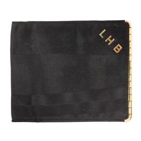 A Tiffany & Co. fabric and 18k gold wallet