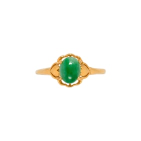 A jade and 14k gold ring
