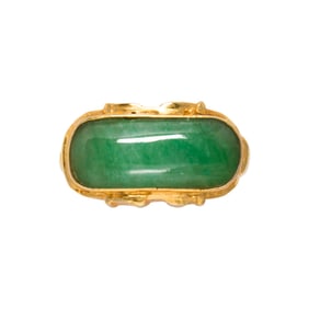 A jade and 14k gold ring