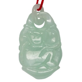 A carved jade pendant
