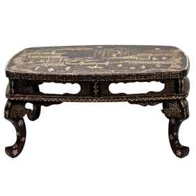 A Japanese mother-of-pearl inlaid black lacquer stand