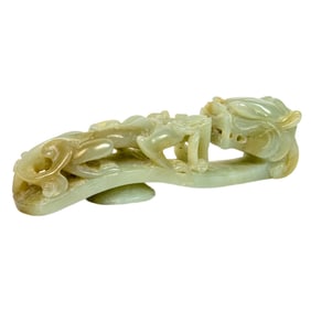 A Chinese white jade belt hook
