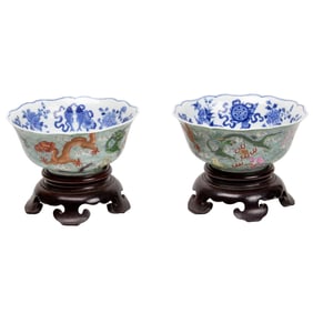 A pair of Chinese polychrome enameled and blue and white 'dragon' bowls