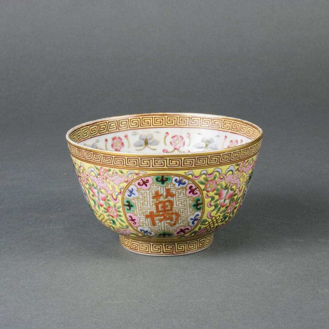A Chinese famille rose 'wanshou wujiang' bowl (1 of 2)