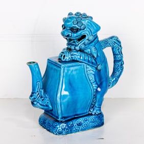 A Chinese turquoise glazed puzzle wine pot