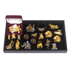 Eighteen costume jewelry brooches comprising Monet, a Camrose & Kross reproduction of a teddy bear