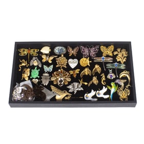 Thirty-nine costume jewelry brooches of birds, insects, sealife, comprising Miriam Haskell, Monet,