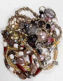 Twelve costume jewelry necklaces [12 total]