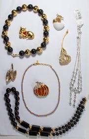 Nine pieces of Napier costume jewelry comprised of necklaces and brooches