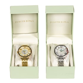 Two Judith Ripka ladies watches in gold tone and silver tone in original boxes
