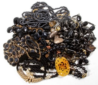 Twelve costume jewelry necklaces [12 total]