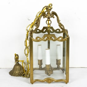 A brass three-light hanging hall lantern