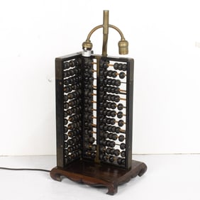 A two-light wood abacus lamp