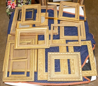 Twenty giltwood picture frames of various dimensions, mostly not antique