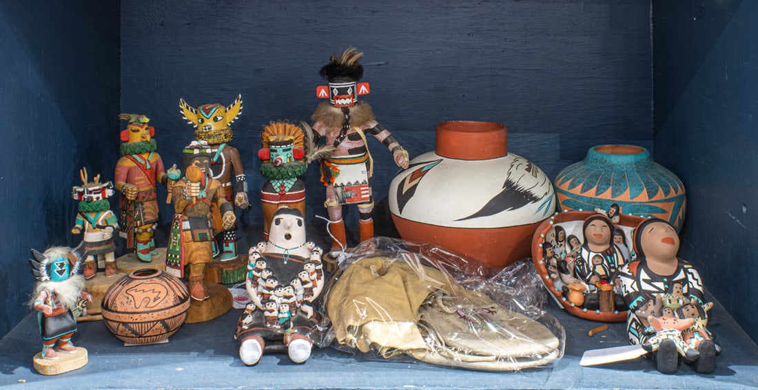 An assembled group of kachina dolls, beaded moccasins and others (1 of 1)
