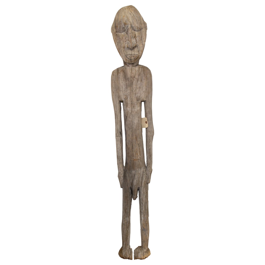A tall standing carved wood male figure, Papua New Guinea (1 of 3)