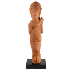 A Janus redware figure