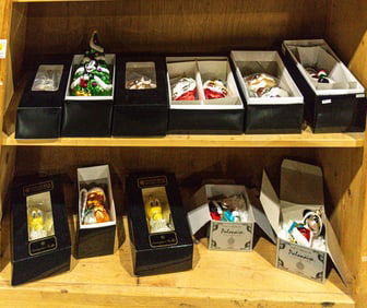 A group of twelve mainly Christopher Radko glass Christmas and other holiday ornaments including