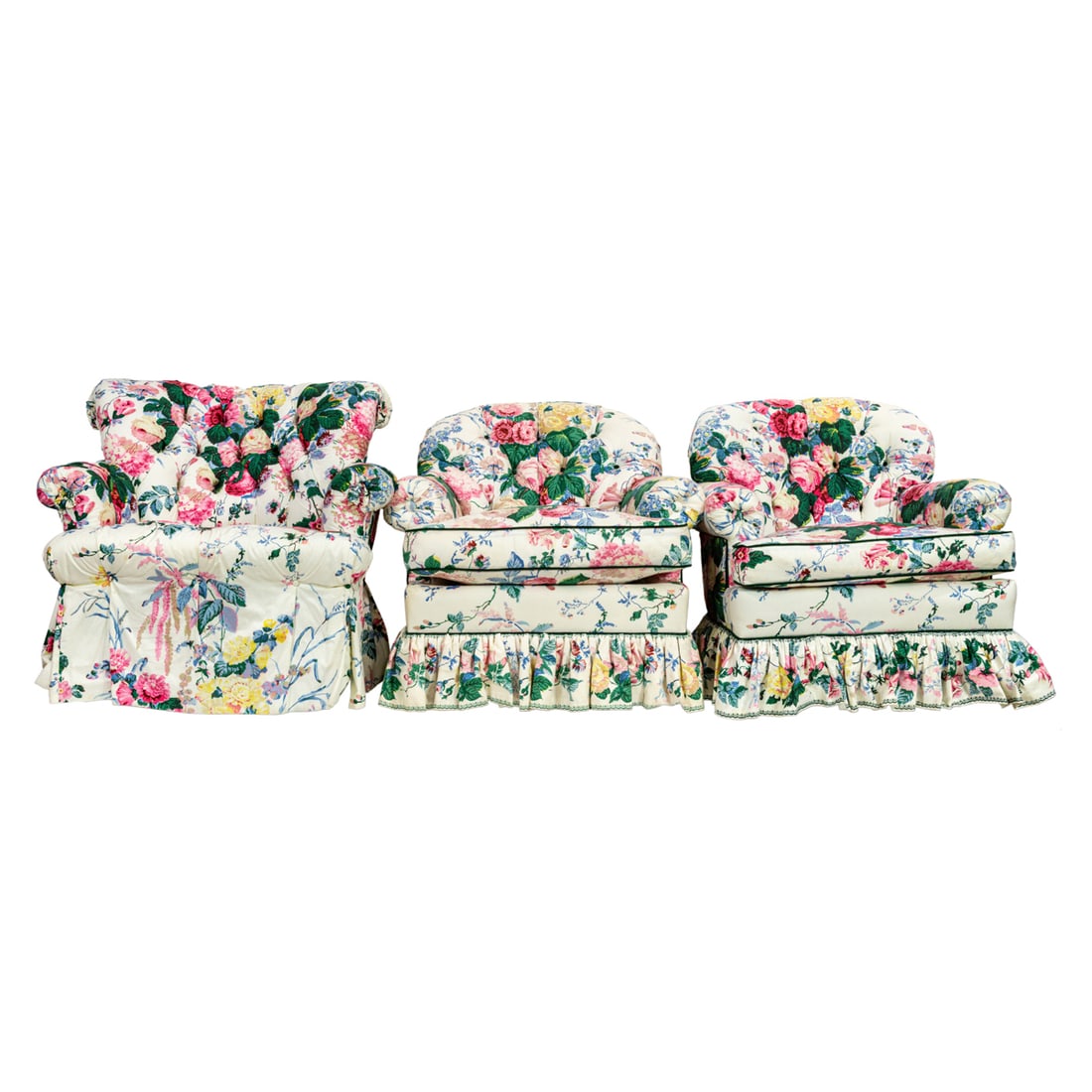 A button tufted lounge chair in Lee Jofa Floral Bouquet upholstery: A button tufted rocker lounge chair in Lee Jofa 'Floral Bouquet' upholstery, 32"h x 36"w x 35"d, seat 21"h. Provenance: The Carole Harris Collection, River Ranch. The interiors guided by Parish-Hadley