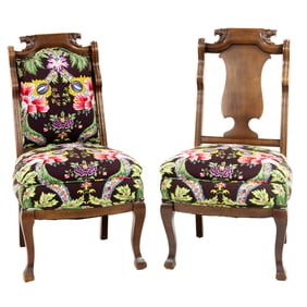 An assembled pair of side chairs upholstered in green