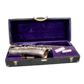 A C.G. Conn silverplate saxophone in case