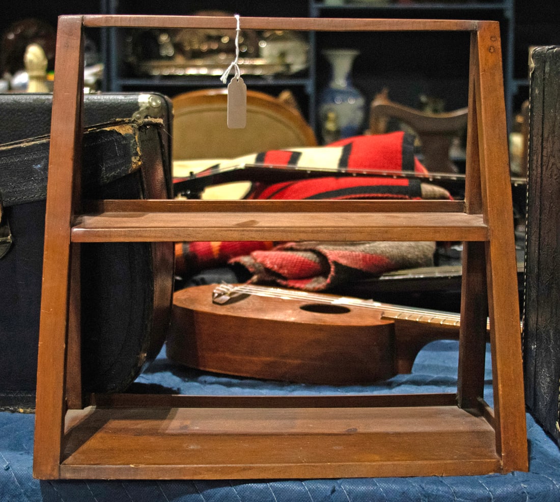 A diminutive mahogany wall shelf: A diminutive mahogany wall shelf, late 19th/early 20th century, 13.5"h x 14"w x 7"d
