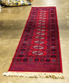 A Bokhara style machine made runner