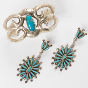 A turquoise and sterling silver cuff and pair of earrings