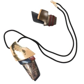An Odell, shakudo, 14k gold, copper and silver necklace and brooch