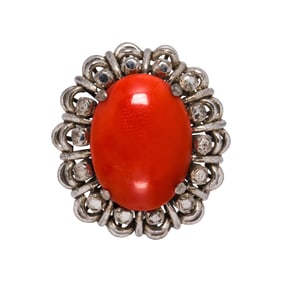 A coral and silver ring