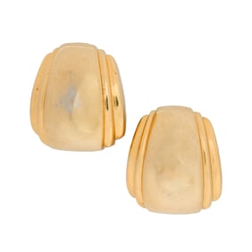 A pair of gold tone ear-clips