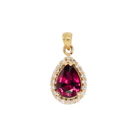 A rubelite, diamond, and 14k gold pendant