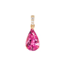 A tourmaline and 14k gold pendant