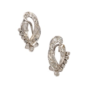 A pair of diamond and white gold earrings