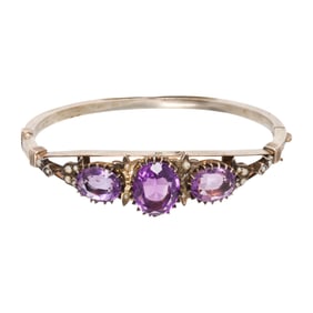 A vintage amethyst, seed pearl and silver bangle bracelet