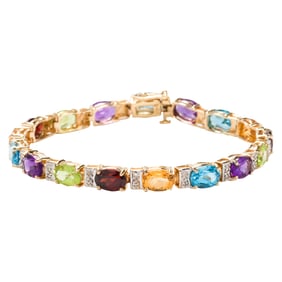 A semi-precious gemstone and 14k gold bracelet