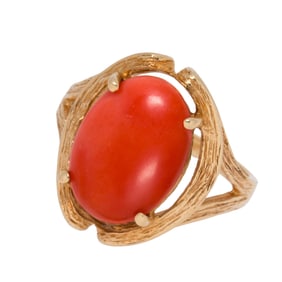 A coral and 14k gold ring