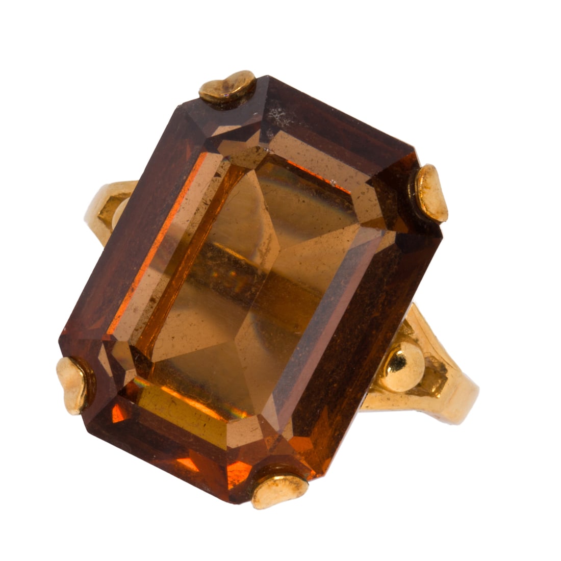 A citrine and gold-filled ring: A citrine and gold-filled ringSet with an emerald-cut citrine measuring approximately 19.91 x 14.97 x 8.87 mm; size 9; 7.20 grams