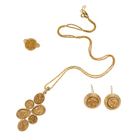 A group of resin-filled 14k gold jewelry