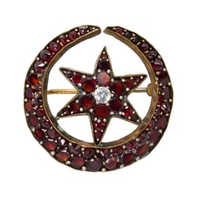 A Victorian bohemian garnet and gold-filled brooch-pendant