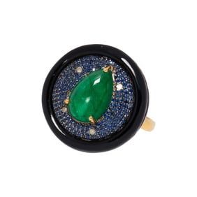An emerald, sapphire, diamond, onyx, silver, and 14k gold ring