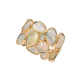 An opal, diamond, and 18k gold ring